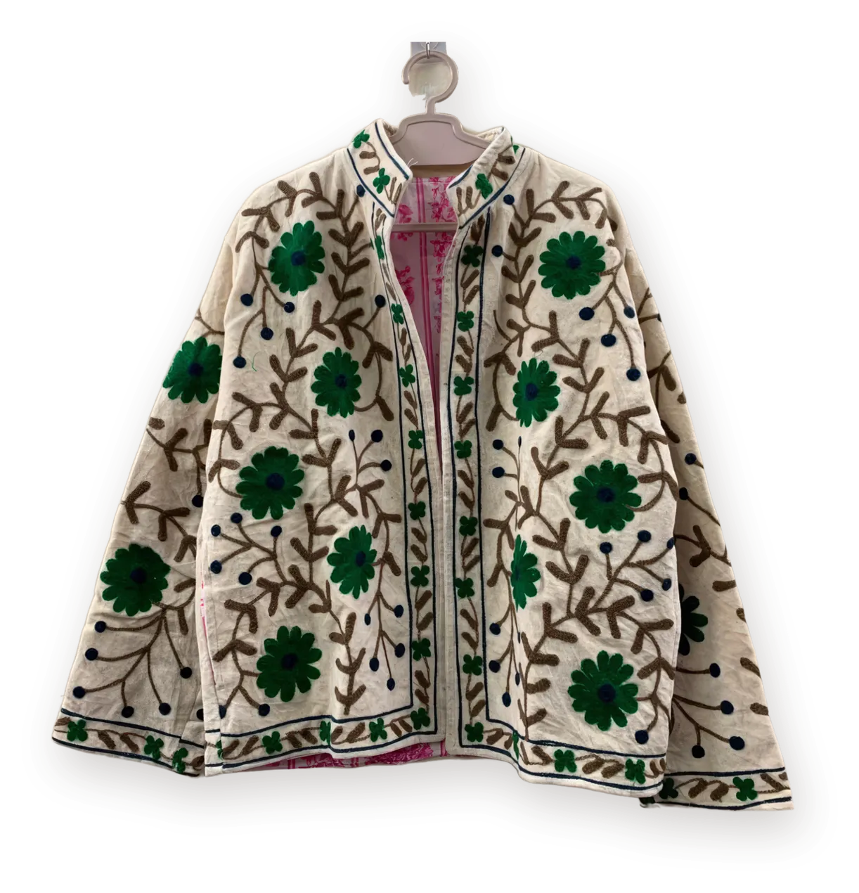 Chaqueta Crema con verde, con su otra cara de toile rosa a la vista en la abertura